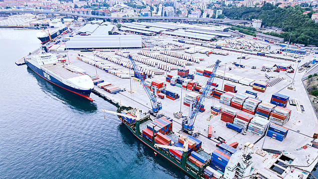 Aerial view of HHLA seaport terminal PLT Italy in Trieste – multi-purpose terminal for containers, RoRo and breakbulk with rail connection.